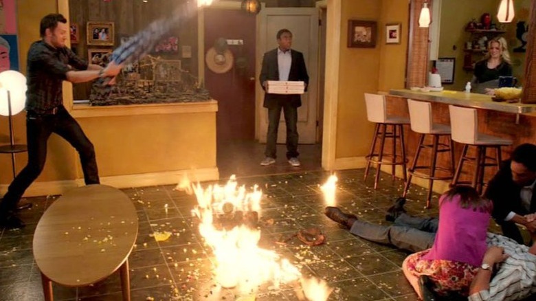 Troy brings pizza, observes chaos