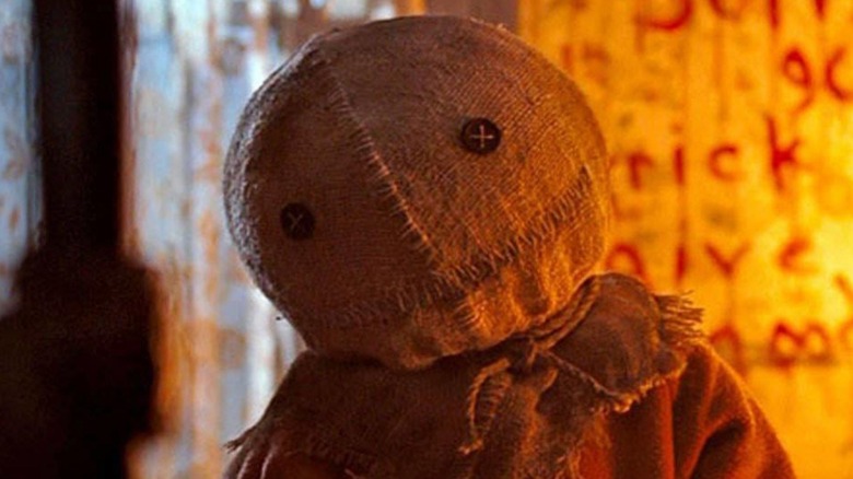 Sam in Trick 'r Treat burning pumpkin