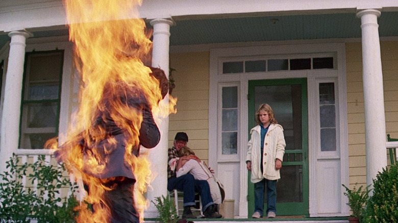 Firestarter dude roasted on porch in front of drew barrymore