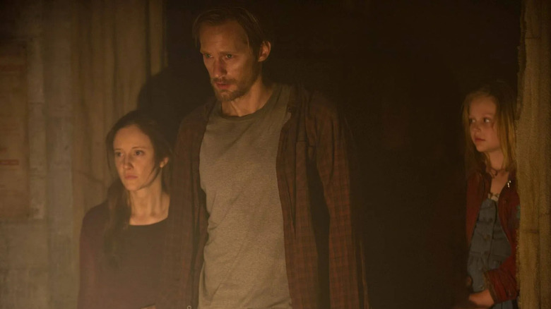 Alexander Skarsgård and Andrea Riseborough and Emily Alyn Lind in Hidden