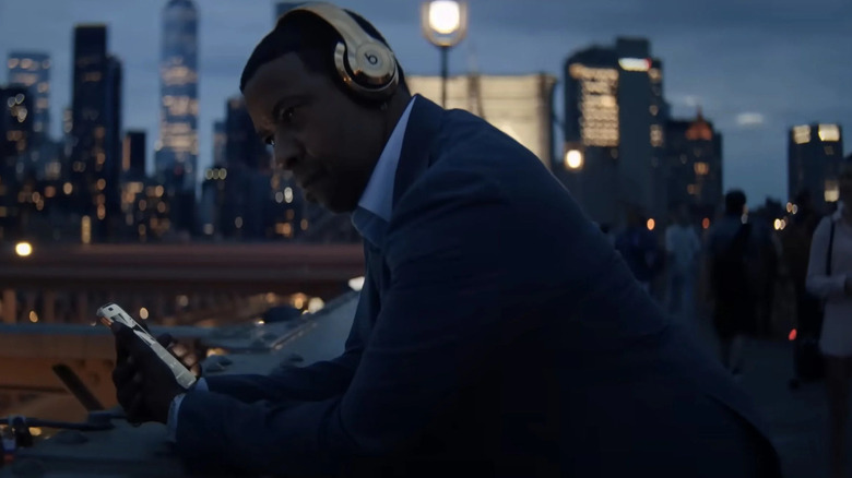 David King listens to music on the Brooklyn Bridge in Highest 2 Lowest