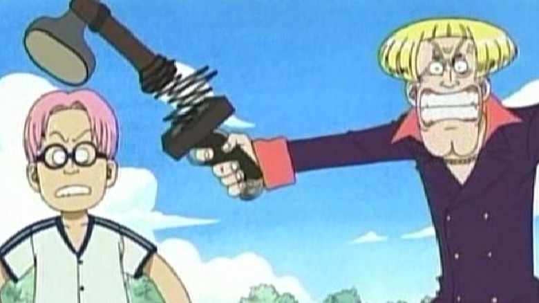 Helmeppo holds a spring-loaded hammer