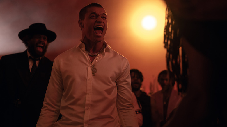 Tyriq Withers as Cameron Cade screaming in anguish while surrounded by shadowy figures in Him