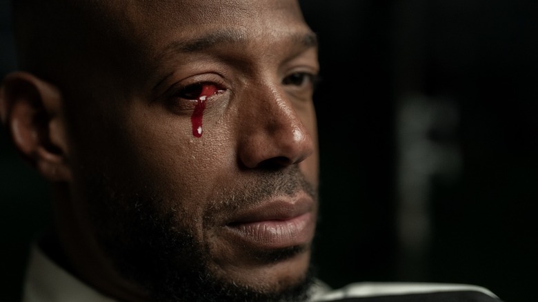 Isaiah white crying a tear of blood in Him