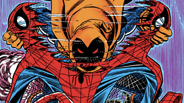 Amazing Spider-Man #238 cover by John Romita Jr. The Hobgoblin tearing empty Spider-Man suit in half