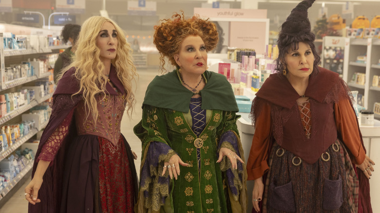Sarah Jessica Parker, Bette Midler, and Kathy Najimy as the Sanderson sisters in the store in Hocus Pocus 2