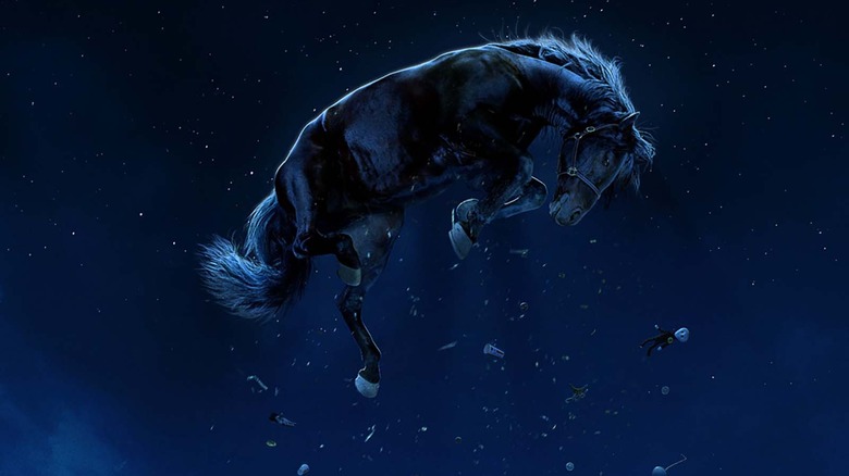 a horse hovering in the night sky