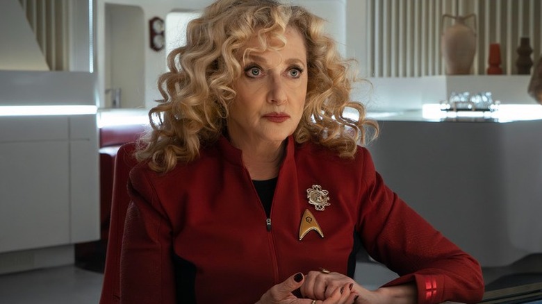 Pelia sitting at a table in Star Trek: Strange New Worlds