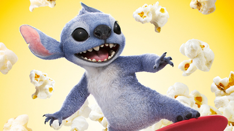 Stitch sitting in a chair wearing sunglasses in Lilo & Stitch (2025)
