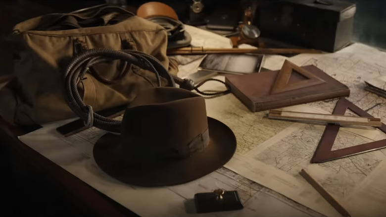 Indy's iconic fedora and whip in Indiana Jones and the Dial of Destiny