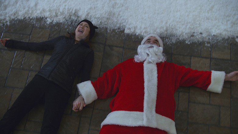 Ellie Kemper and Rob Delaney in Home Sweet Home Alone