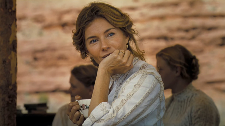 Sienna Miller holding teacup