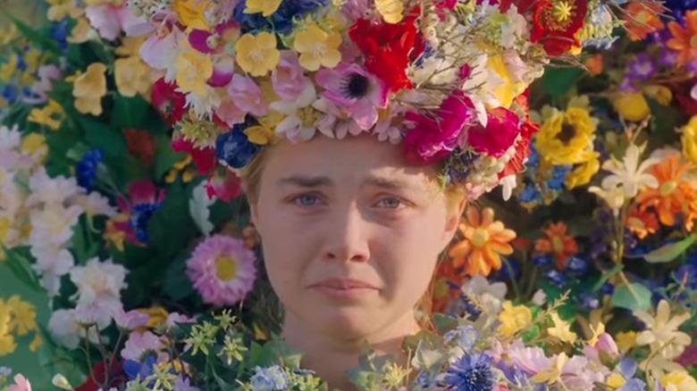 Florence Pugh covered in flowers in Midsommar