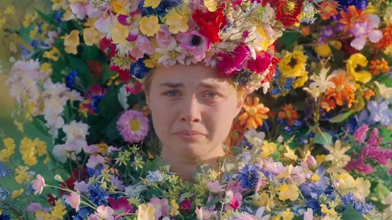 Florence Pugh covered in flowers in Midsommar