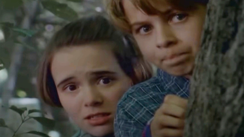 Amanda and Josh looking scared in Goosebumps: Welcome to Dead House