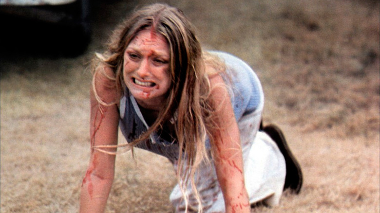 Sally Hardesty (Marilyn Burns) escapes death in The Texas Chain Saw Massacre (1974)
