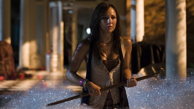 Briana Evigan clutching cane