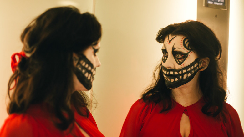 Alice Lowe as Ruth face paint in