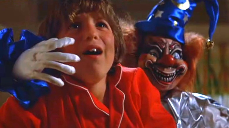 Clown doll grabbing Robbie