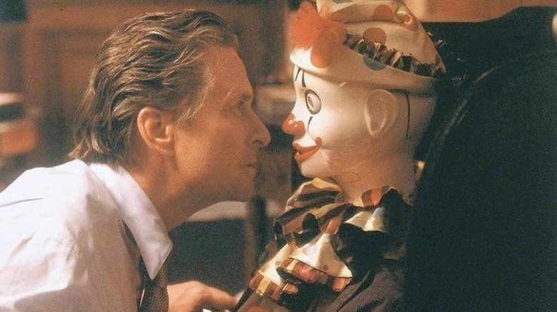 Michael Douglas confronts a clown