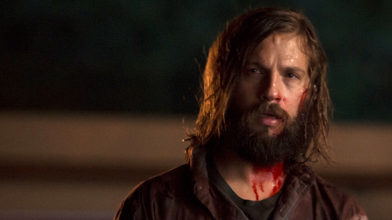 Logan Marshal Green covered in blood