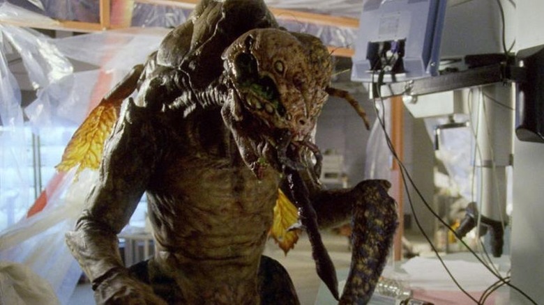 humanoid mosquito creature stands