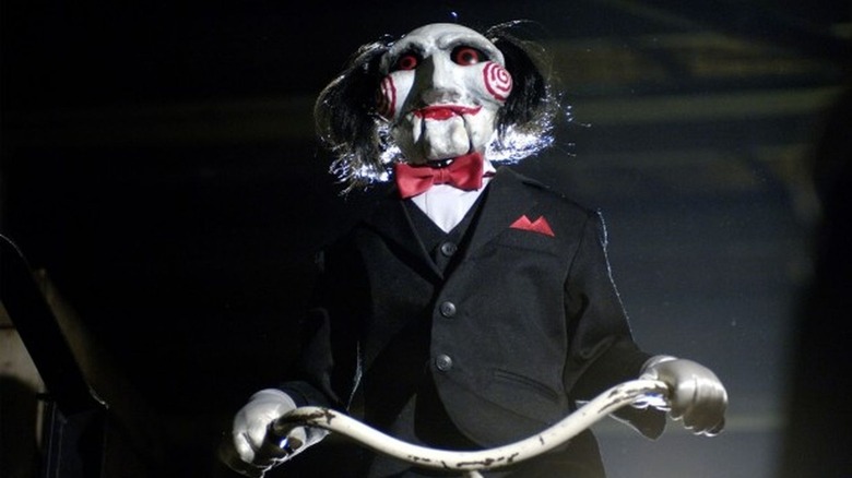 Jigsaw from Saw riding tricycle 