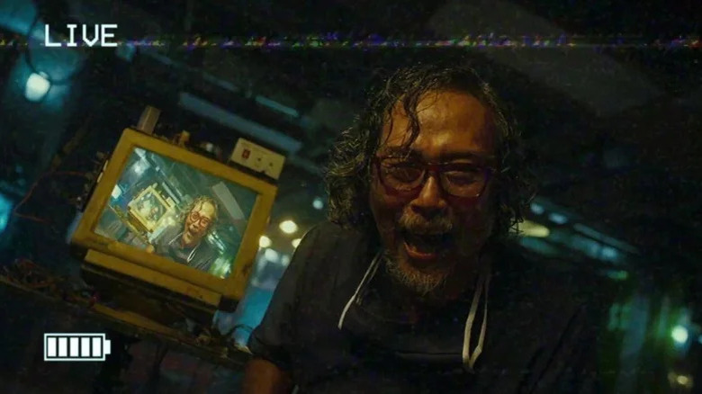 Man smiling at camera in V/H/S/94