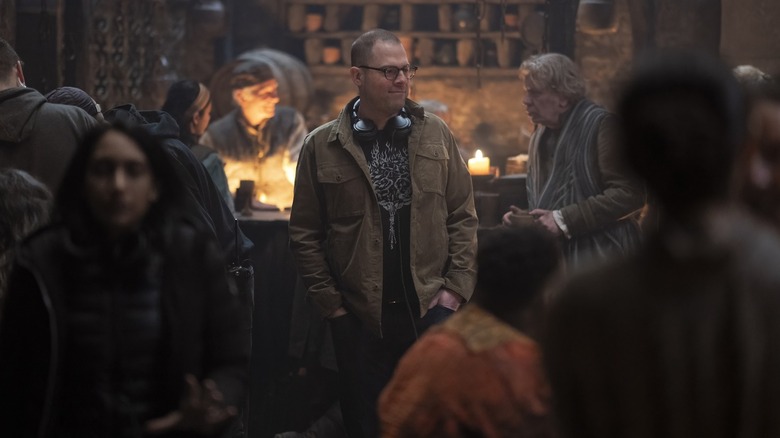 Showrunner Ryan Condal on the set of House of the Dragon in a behind-the-scenes image from season 2