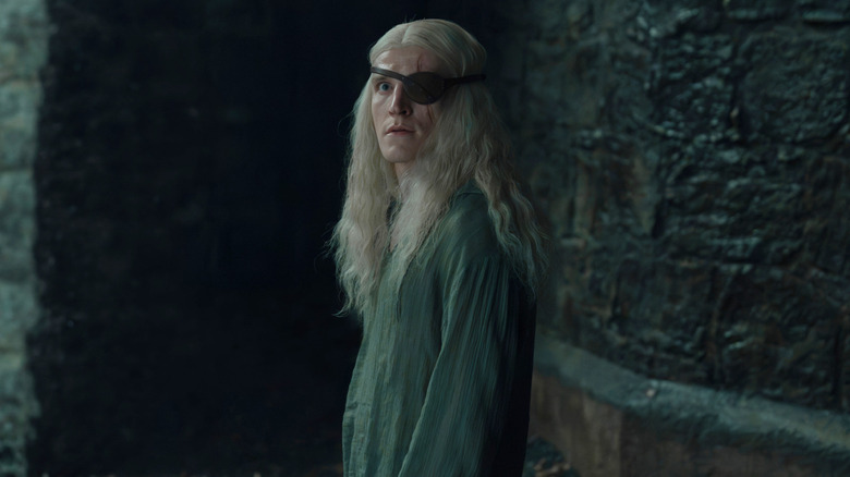 Ewan Mitchelle as Aemond Targaryen wearing an eyepatch in House of the Dragon