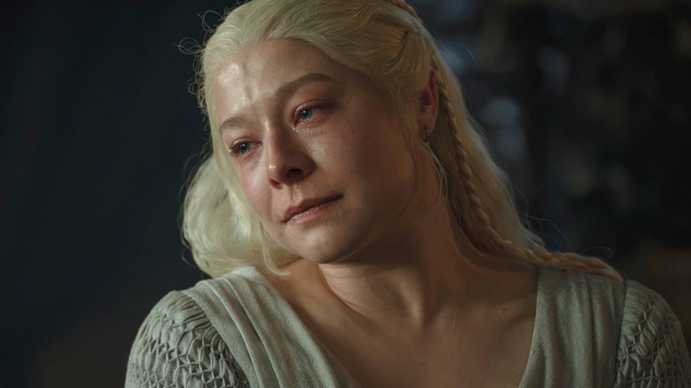 Emma D'Arcy as Rhaenyra Targaryen wearing a nightdress with tears in her eyes in House of the Dragon