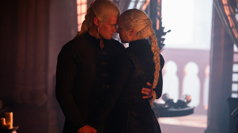 Matt Smith as Daemon Targaryen embracing Emma D'Arcy as Rhaenyra Targaryen in House of the Dragon