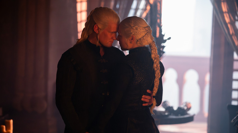 Daemon and Rhaenyra embracing in House of the Dragon