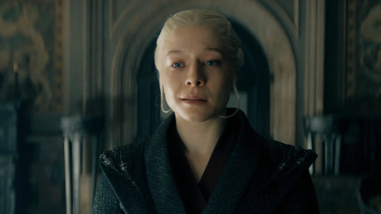 Queen Rhaenyra Targaryen (Emma D'Arcy) with her eyes filled with tears in House of the Dragon