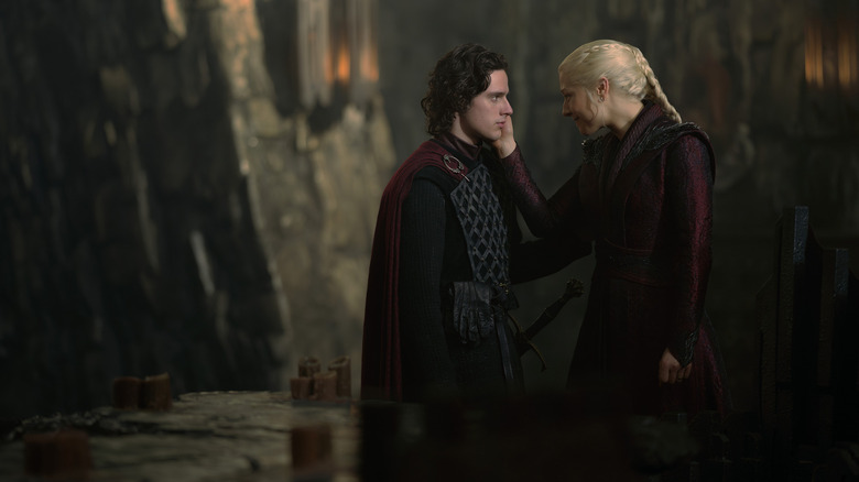 Emma D'Arcy as Rhaenyra Targaryen caressing the face of Harry Collett as Jacaerys Targaryen in House of the Dragon