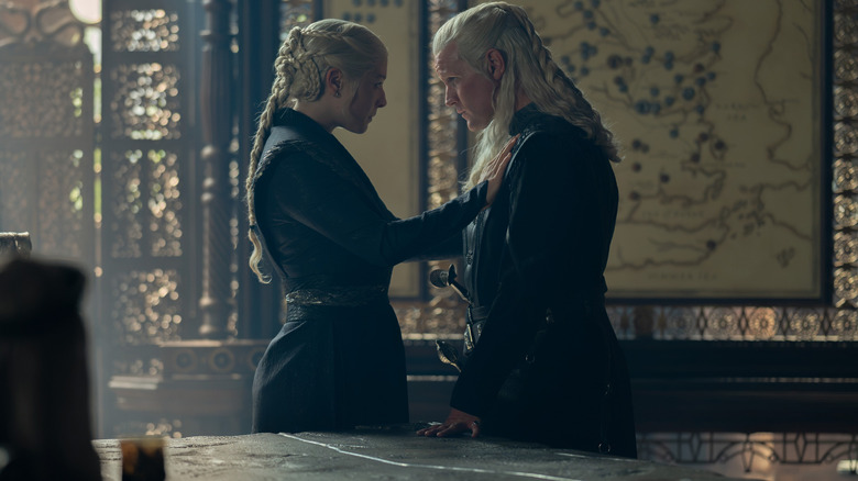 Emma D'Arcy as Rhaenyra Targaryen resting her arms against the chest of Matt Smith as Daemon Targaryen in House of the Dragon