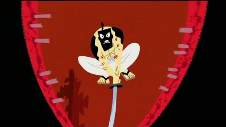 Samurai Jack oil stained jack cuts beetle in half with sword