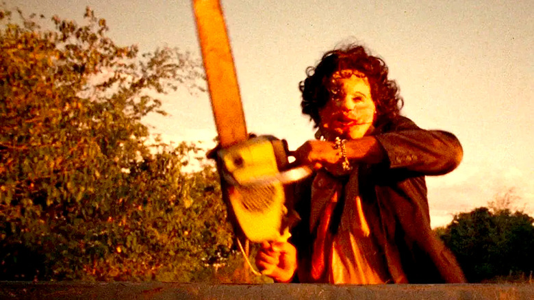 Leatherface chases a truck in "The Texas Chain Saw Massacre"
