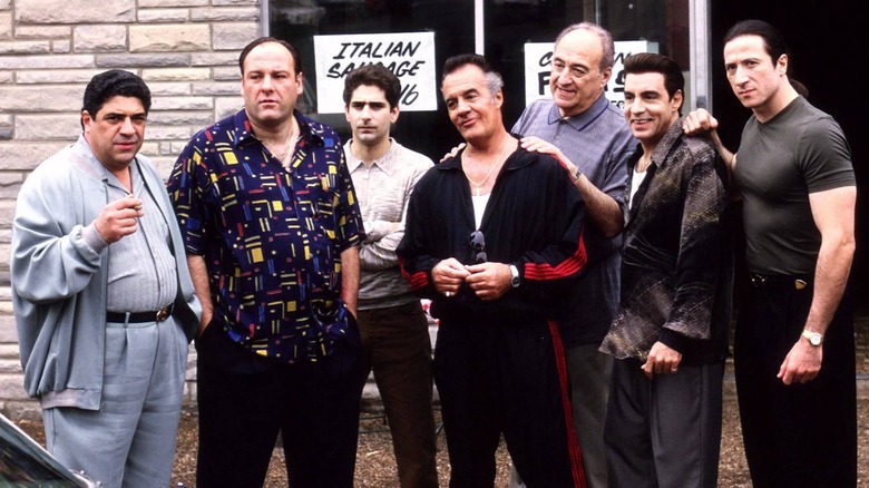 The Sopranos crew stands outside of Satriale's