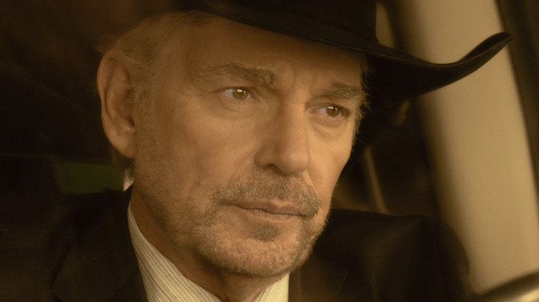 Billy Bob Thornton's Tommy Norris is seen in closeup as he sits in his car in Landman.jpg