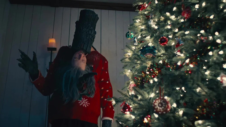 Yule Log popping out of Grandma in Adult Swim Yule Log 2