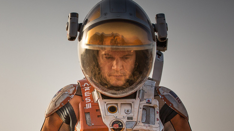 Matt Damon as Mark Watney wandering around Mars in The Martian