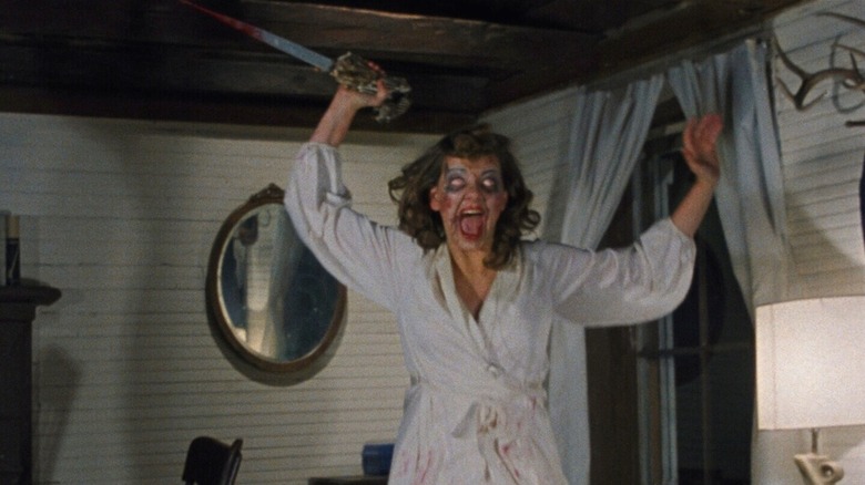 The Evil Dead Linda possessed running with Knife