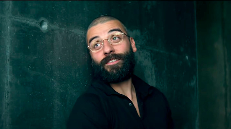 Nathan sits and talks to Caleb in "Ex Machina"