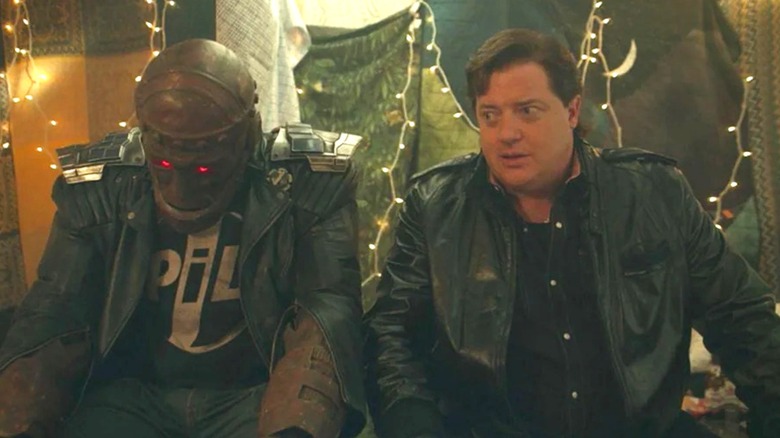 Brendan Fraser as Cliff Steele sitting next to Robot Man in Doom Patrol