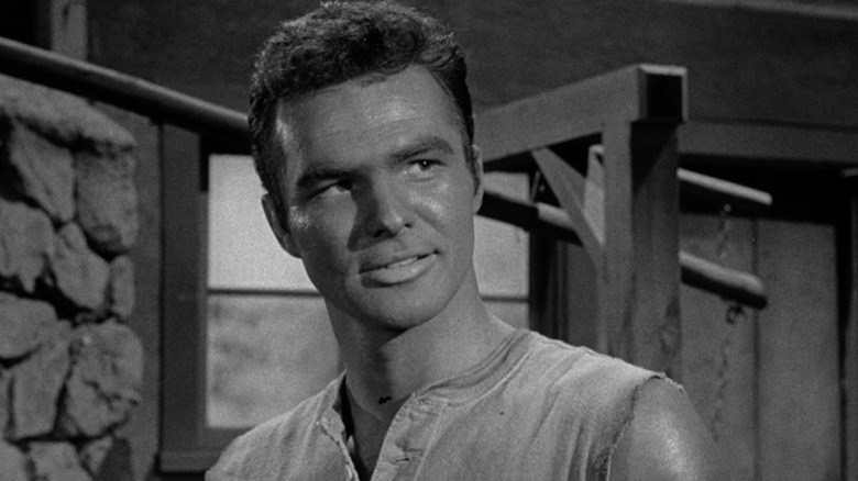 Quint Asper (Burt Reynolds) grinning in Gunsmoke