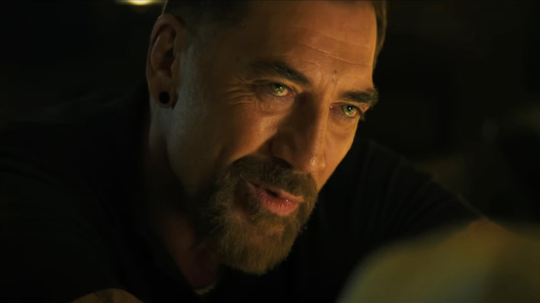 Max Cady speaks with a conspiratorial gaze in Cape Fear