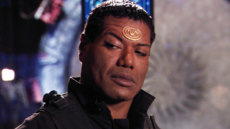 Christopher Judge's Teal'c looks off to his right in Stargate SG1