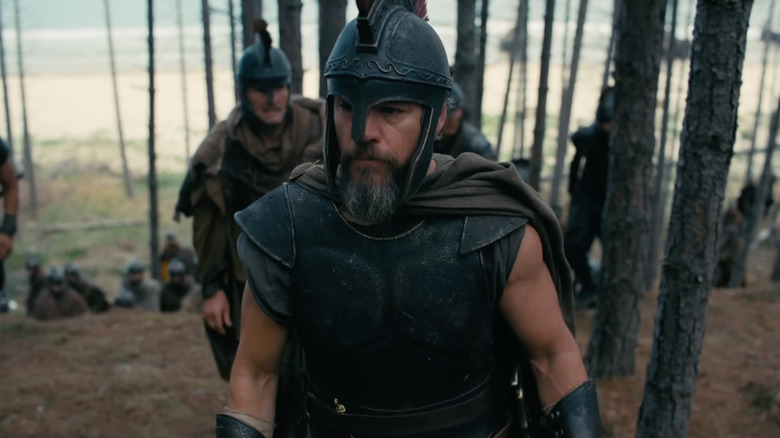 Odysseus walking through a forest with his troops in The Odyssey