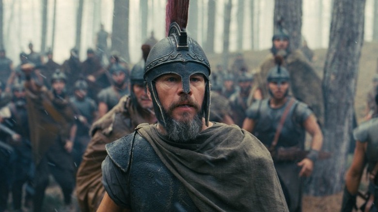 Odysseus leading his troops through forest in Christopher Nolan's The Odyssey
